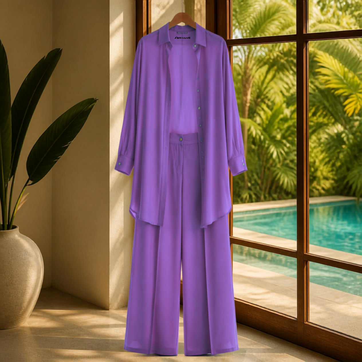 A Soft Elegance Set- Kaftan Top and Pant, showcasing a vibrant african  matching kaftan set African outfit in violet. This elegant african-inspired two piece set features a sheer kaftan shirt and stylish pants, highlighting the subtle beauty of women attire. The outfit reflects a modern west african suit styling and embodies the essence of west african fashion, making it a perfect choice for various occasions. Explore the charm of african kaftan styles for ladies with this stunning look.